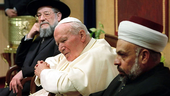 Pope John Paul II meets with Jewish, Muslim leaders in Jerusalem in 2000. (CNS photo/Arturo Mari, L'Osservatore Romano)